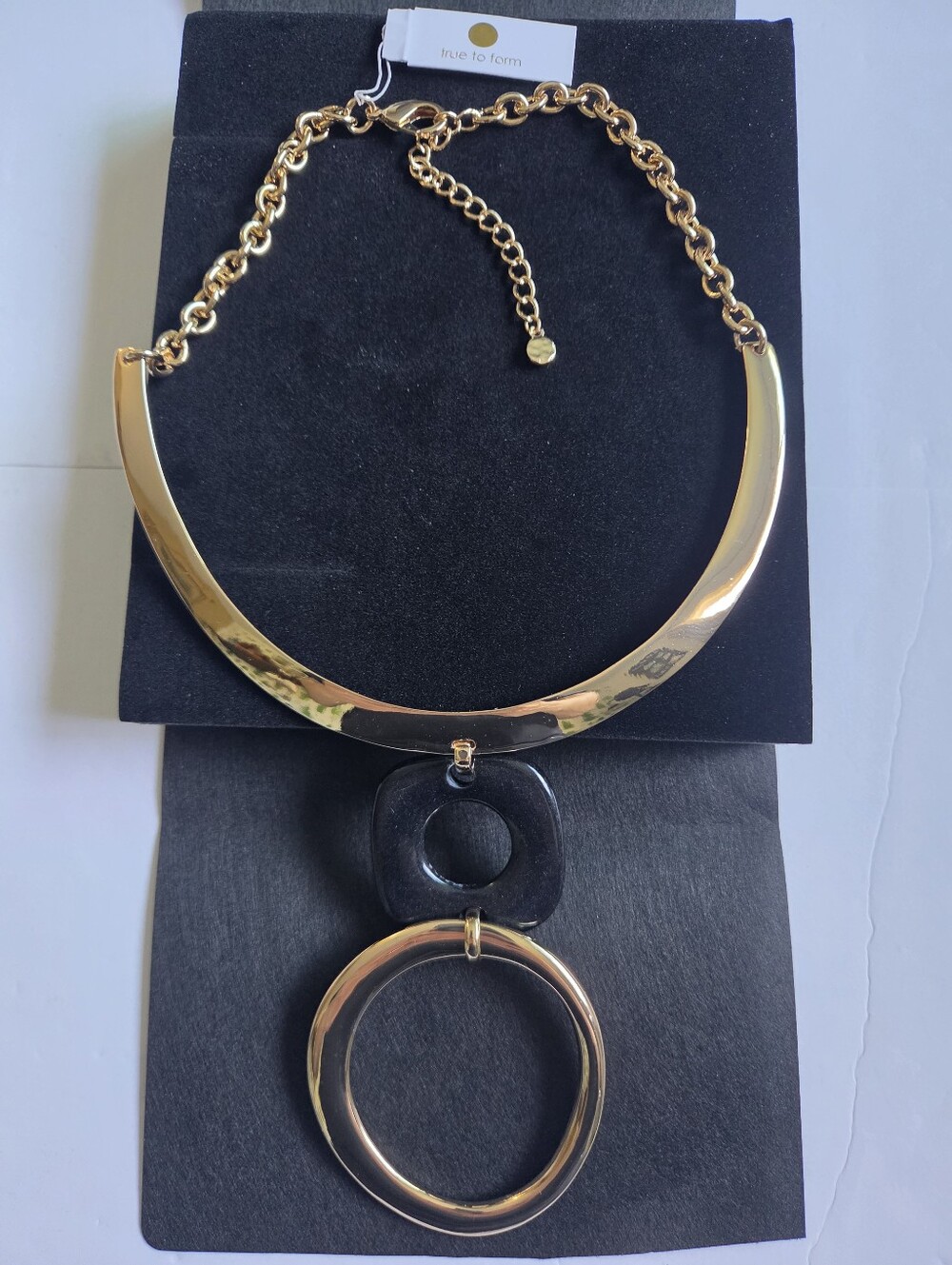 True To Form Gold-Tone Statement Necklace with Black Pendant